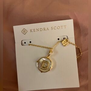Never worn or used Kendra Scott necklace with a D initial